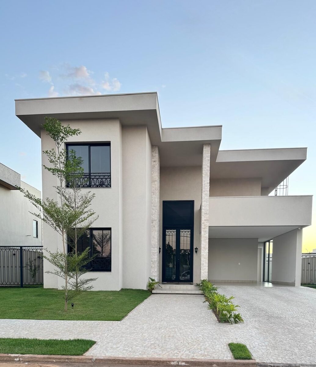Casa moderna de alto padrão com fachada minimalista entregue pela Quinto Construtora